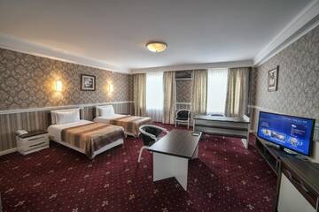 Фото номера Стандартный двухместный номер с 2 отдельными кроватями Отель Hotel Orto Asia г. Ош 7