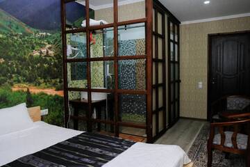 Фото номера Улучшенный двухместный номер с 1 кроватью Гостевой дом Eco House г. Ош 9