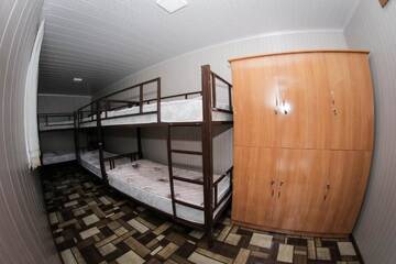 Фото номера Спальное место на двухъярусной кровати в общем номере для женщин Загородные дома TES Hotel г. Ош 4