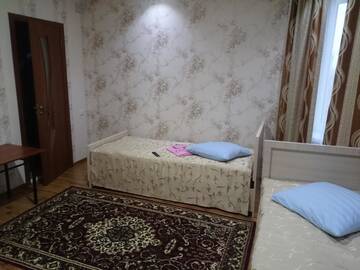 Фото номера Стандартный двухместный номер с 2 отдельными кроватями Гостевой дом Guest House Voyage Osh г. Ош 2