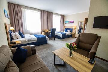 Фото номера Двухместный номер с 2 отдельными кроватями Отель Rayan Hotel г. Ош 2