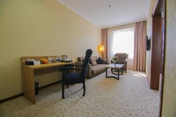 Фото номера Двухместный номер Делюкс с 1 кроватью Отель Rayan Hotel г. Ош 4