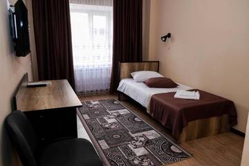 Фото номера Одноместный номер с душем Отель ORIENT г. Ош 4