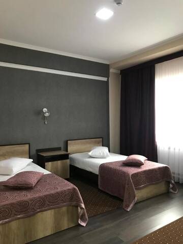 Фото номера Двухместный номер с 2 отдельными кроватями и душем Отель ORIENT г. Ош 7