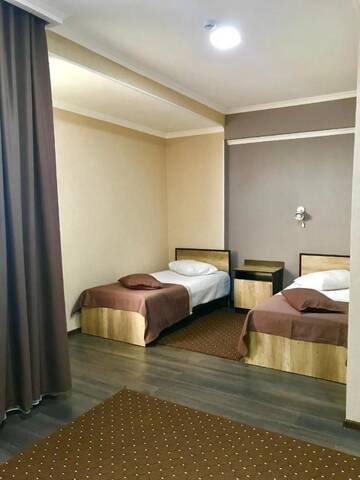 Фото номера Двухместный номер с 2 отдельными кроватями и душем Отель ORIENT г. Ош 8
